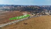 Strategick� pozemek 11 125 m? u sjezdu z D1 (�toky)