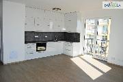 Pron�jem novostavby 2+kk s balkonem a gar�ov�m st�n�m.