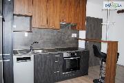 Pron�jem novostavby bytu 1+kk s lod�i� a gar�ov�m st�n�m.
