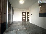 Pron�jem novostavby bytu 3+KK s parkovac�m st�n�m a zahradou.
