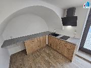 Pron�jem bytu 1+kk v obci D��ina