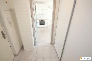 Novostavba, za��zeno: Byt 2+kk/B, sklepem a gar�ov�m st�n�m, u metra Kolbenova, ulice Strnadov�ch