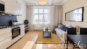 Pron�jem slunn�ho bytu 2+kk, 45m2 s v�hledem do zahrady v bl�zkosti metra Kobylisy