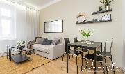 Pron�jem slunn�ho bytu 2+kk, 45m2 s v�hledem do zahrady v bl�zkosti metra Kobylisy