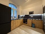 Pron�jem nov� zrekonstruovan�ho apartm�nu 1kk v reziden�n� vile se zahradou