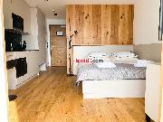 Pron�jem apartm� 1+kk s gar�ov�m parkovac�m st�n�m v centru �pindlerova Ml�na