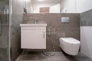 Pron�jem luxusn�ho bytu 1+KK v novostavb� v Kobylis�ch, ul. Pakom��ick�.