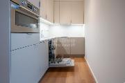 Pron�jem luxusn�ho bytu 1+KK v novostavb� v Kobylis�ch, ul. Pakom��ick�.