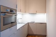 Pron�jem luxusn�ho bytu 1+KK v novostavb� v Kobylis�ch, ul. Pakom��ick�.