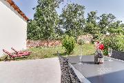 Pron�jem bytu 1+kk + terasa + zahrada, obec Vojkovice, okres M�ln�k.